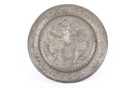 A German pewter charger with a raised heraldic coat of arms. Diameter 31.