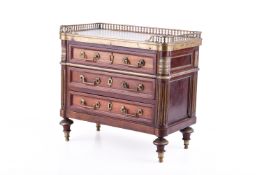 A 19th Century miniature continental marble topped three drawer chest.