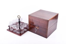 A 19th Century rosewood inlaid box containing drinking nine dessert glasses on a lift out tray.