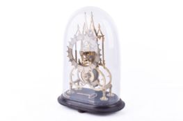 A brass skeleton clock under a glass dome.