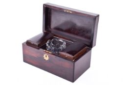 A 19th century rosewood tea caddy.