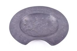 A French pewter barber's shaving bowl, 'Le Melanogene Dicquemare de Rouen'.