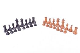 An early 20th century Staunton style fruitwood and ebony chess set (af).