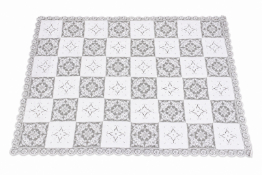 An antique lace table cloth with twelve napkins.