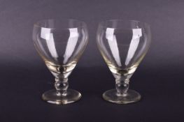 A pair of circa 1900 glass rummers. A slight yellowish tinge to the glass, H15.5cm, diameter 10.5cm.