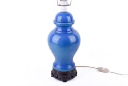 A Chinese ginger jar style table lamp with blue crackle glaze.