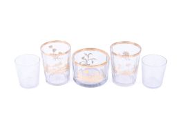 A set of three 19th century Bohemian gilt decorated octagonal cut glassware.