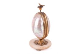 A 19th Century French mother of pearl watch holder.
