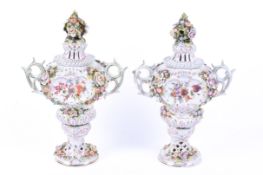 A pair of late 19th century German Sitzendorf flower urns.