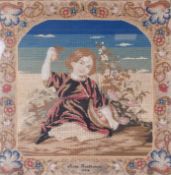 A circa 1854 Berlin woolwork needlepoint tapestry, depicting a child with a basket of fruit.