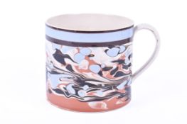 A late 18th century creamware marble pattern mug.
