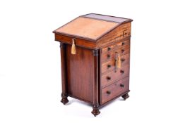 A Victorian rosewood davenport desk.