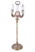 A brass table lamp in the form of a four stem candelabra.