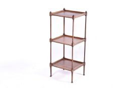 A Victorian mahogany three tier whatnot. Three quarter gallery shelves, raised on turned supports.
