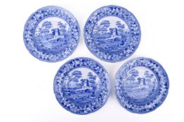Four Tower Spode blue and white Copeland bowls with scalloped edges.