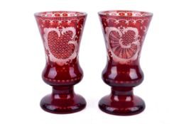A pair of early 20th century Bohemian ruby 'Spa' glasses.