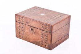 A Victorian walnut straw work, work box with central mother of pearl inlay.