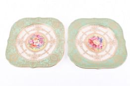 Two Royal Worcester hand painted cabinet plates with gilt detail and central floral collage. W.