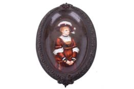 A 19th century continental porcelain painted miniature portrait plaque, in a cast bronze frame.