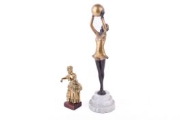 An Art Deco style bronze finish figurine after Josef Lorenzl and a brass model of a lady.