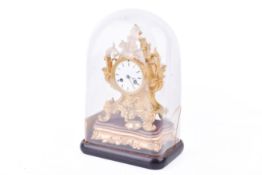 A 19th century French gilt brass ormolu mantel clock and glass dome.