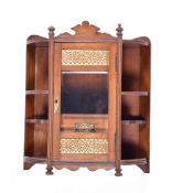 A Victorian oak smokers cabinet.