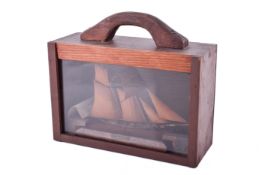 A scratch built wooden model of the Baltimore clipper schooner 'Ghost'.