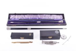 Two silver mounted Victorian conductor's batons and a later miniature trombone and flute.