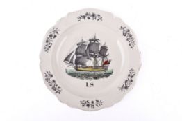 A 'Swansea' creamware scalloped edge plate with a transfer printed ship and the letters I.S. below.
