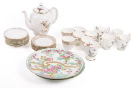 A Crown Staffordshire coffee set, mostly for three with other porcelain items.