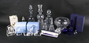 A collection of mostly glassware.