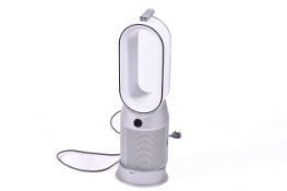 Dyson Purifier HP07 floor standing fan with two remote controls.