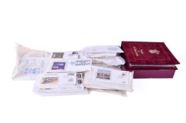 A collection of assorted first day covers and some post cards. Including an as new album, etc.