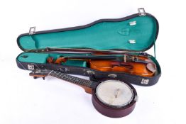 Two musical string instruments. Consisting a cased Chinese violin and a cased Keech banjolele.