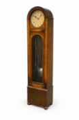 An eight day circa 1930's art deco an arched oak case grandmother clock.