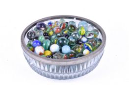 A collection of 20th century glass marbles.