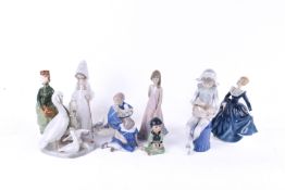 Collection of assorted porcelain figures. Including Royal Doulton, Royal Copenhagen and Lladro, etc.