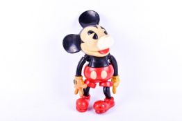 An articulated plastic Mickey mouse figure.