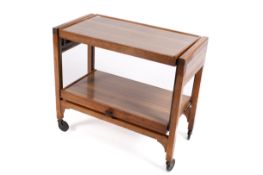 Mid-century extending hostess trolley by Besway, England. With original rotating Flexello wheels.