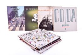 A collection of assorted vintage LP vinyl guitar rock records, mostly 1960s and 70s.