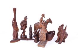 A group of assorted carved wood items, some Black Forrest.