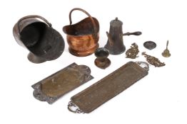 A collection of assorted brass and copper items. Including coal skuttles, etc.