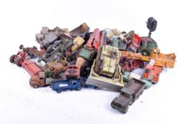 A collection of assorted playworn vintage Dinky and Corgi diecast vehicles in a basket H30cm X