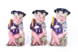 Three Melba pottery Punch and Toby dog character jugs.