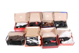 A collection of assorted men's sports trainers shoes, boxed.