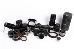 A Nikkormat FTN 35mm SLR camera outfit. Black. Serial number FT 4260283.