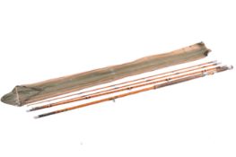 A vintage Hardy's 'L R H Salmon Fly', four piece cane fishing rod, with bag.