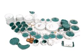 A large collection of mid-century Denby Greenwheat stoneware tableware.