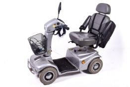 A Rascal 388XL four wheel mobility scooter, with charger and key.