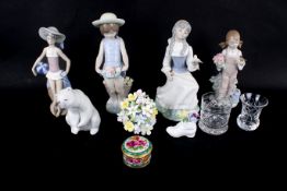 A collection of Spanish and other porcelain items. Including Lladro and Nao figurines, etc.